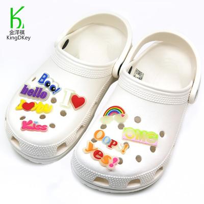 China PVC Rubber Soft Rubber Luminous Hole Shoes Colorful Character Buckle Decorative Props For Kids for sale