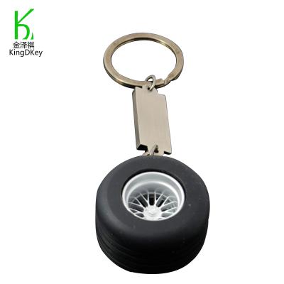 China Customizable Cool Key Chain Shape 3D Shape PVC Gift Rubber Tire Promotional Soft Keychain Cool Tire Around Key Chain for sale