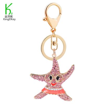 China Crystal Starfish Keyring Sea Creature Cartoon Rhinestone Cartoon Metal Women Pendant Handbag Accessory Key Chain for sale