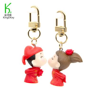 China Decoration Lovers Customize Cute Dangling Groom And Bride Pair Of Cartoon Dolls Activity Party Key Wedding Gifts for sale