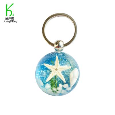 China Creative Decoration Lovely Resin Keyfob Ball Shaped Sea Animals Theme Keytag Starfish Seashell Key Chain Pendant Key Ring for sale