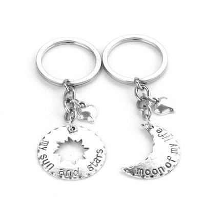 China Fashionable Retro Personalized Accessories 2 Pcs / Set Lettering Keychain Hollow Moon Sun Shape Key Chain For Couples for sale