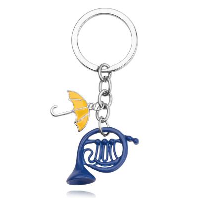 China Fashionable Popular Cartoon Blue Color Anime Jewelry Vintage Trumpet Pendant Umbrellas Shaped Key Chain For Gift for sale