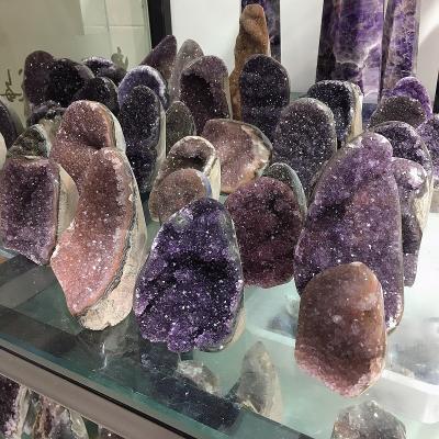 China Fengshu Colored Amethyst Crystal Geode Europe Uruguay Natural Amethyst Group Wholesale Approximate Prices for sale