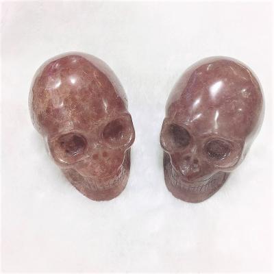 China Wholesale High Quality Europe Gemstone Skulls Hand Carved Natural Quartz Strawberry Crystal Skulls for sale