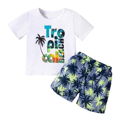 China Boys Cartoon Dinosaur Print Letter Summer Casual Hot Children's Clothes Round Neck T-shirt + Shorts Printed Two-Piece Set for sale