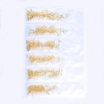 China Hollow Nail Art DIY Decoration 6 Grid Pack Metal Frame Patch DIY Nail Art Decorations 3d Alloy Star Month Rivet Nail Art Retro for sale