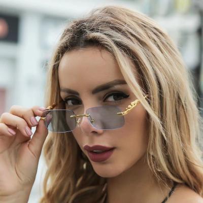 China Fashion Sunglasses Vintage Shape Square Rimless Sunglasses Women Men Brand Designer Popular Travel Driving Metal Leopard Head Luxury Sun Glasses for sale