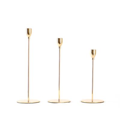 China Wholesale Eco-Friendly Simple Modern Home Decoration Gold Iron Metal Candle Holders Tall Candle Holders for sale