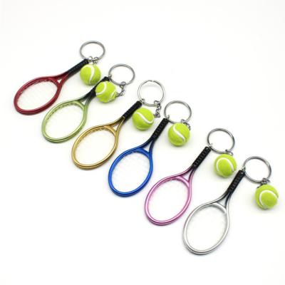 China Wholesale Sports Team 12G PVC Key Chain Famous Plastic Souvenirs And Gifts Tennis Racket And Ball Key Chains for sale