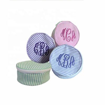 China Fashion Striped Cotton Seersucker Storage Bag Wholesale Women Monogram Zipper Cotton Seerstriped Round Makeup Bag for sale