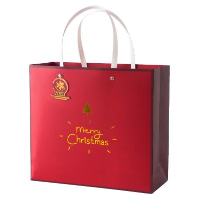 China New Recycled Materials Christmas Eve Card Materials Christmas Series High-Grade Portable Gift Bag Customized Size Printing LOGO Christmas Gift Bag for sale