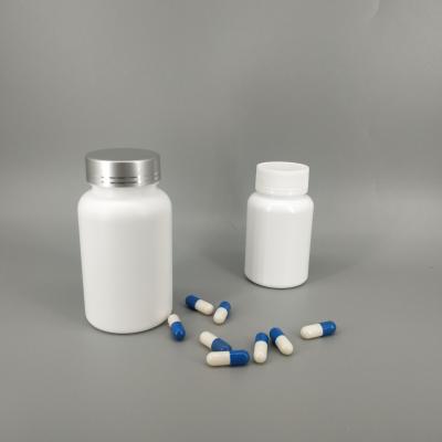 China Medicine pe plastic vial solid powder medicine pill tablet round shape bottles with screw cap en venta