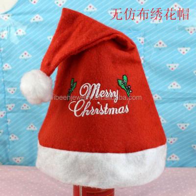 China Adorable Customized Embroider Logo Non Woven Fabric Hat Plush Non Leave Pattern Hat Merry Christmas Hat for sale