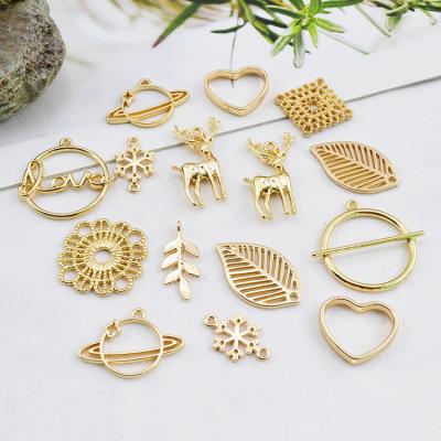 China Jewelry Making Geometric simplicity alloy pendant personality Planet leaf Snowflake elk hand for DIY earring material accessories for sale