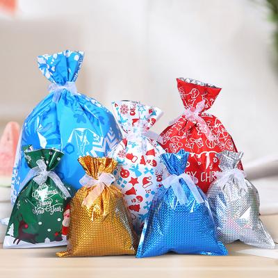 China Up-to-date Desgin Wholesale Colorful Waterproof Durable Plastic Christmas Mini Candy Gift Bag for sale