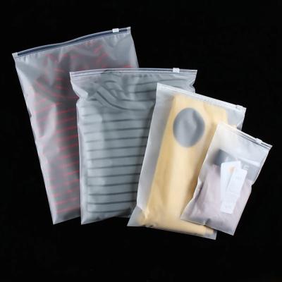 China Matte Frosted Plastic Packaging Recyclable Custom Zipper Bags T-shirt Swimwear Zipper Lock Apparel Bags With Logo for sale