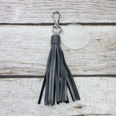 China Acrylic Soft Faux Leather Tassel White Monogram Bohemia 45mm Disc Keychains Key Chains Dangle for sale