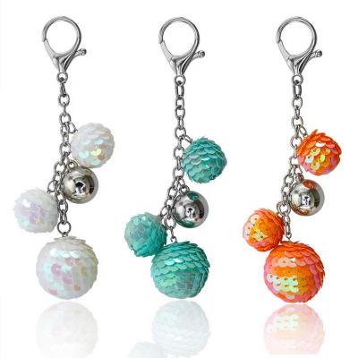 China Newly Customized Glitter Shiny Ball Car Keychains Women Handbag Bag Key Chain Pendant Spherical Key Ring for sale