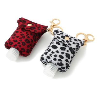 China Europe Portable Leopard Gliter Leather Hand Sanitizer Bottles Key Chain PU Leather Cover Travel Gel Bottles Disinfection Bottle Key Chain for sale