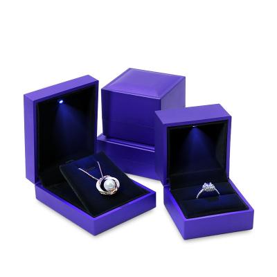 China Gift & Craft Wholesale Lacquer Engagement Ring Case Bracelet Box With LED Blue Rubber Light for sale