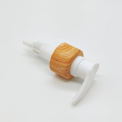 China Non Spill New Design Wood Bamboo Paint Plastic Up-down Screw On Lotion Pump Hand for sale