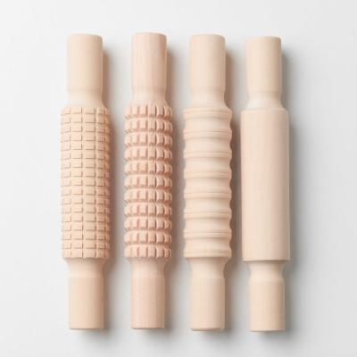 China Sustainable Wooden embossed rolling pin Lotus 4-piece children's toy Rolling pin gifts for children for sale