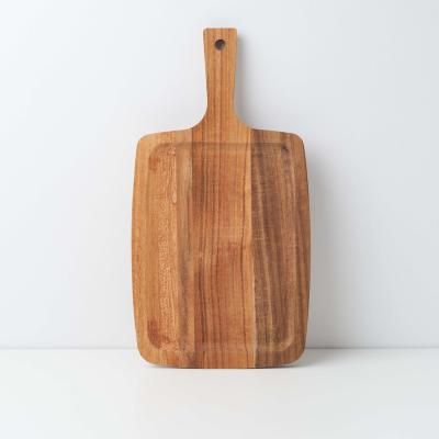 China Sustainable Factory direct Acacia wood pizza board household handle design cutting board for sale