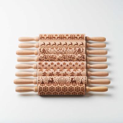 China Sustainable Manufacturers supply beech printing rolling Pin Christmas deer rolling pin set arbitrary pattern for sale