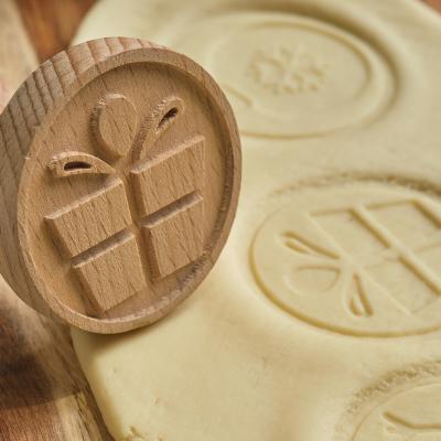 China Sustainable Factory custom kitchen accessories wooden carved cookie mold, Christmas special theme snowflake, snowman and other pattern mold for sale