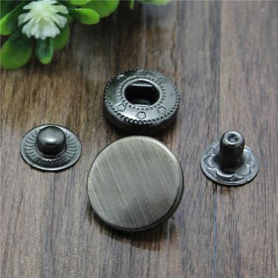 China Sustainable Luxury Gunmetal Brushed Brass Snap Knob 17mm With Custom Size for sale