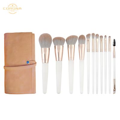 China Angular Blush Hot Sale 10pcs Full Hair Synthetic Wooden Handle Luxury White Eye Makeup Brush With Bag for sale