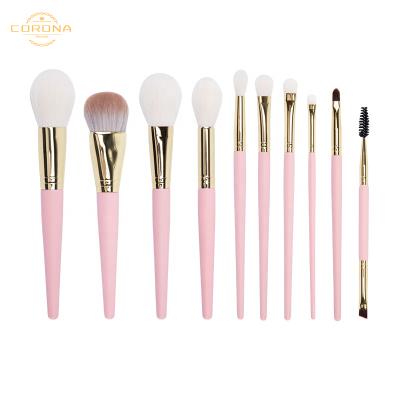 China Angular Blush Hot Sale 10pcs Goat Hair Color Pink Candy Individual Wooden Handle Eye Makeup Brush Set for sale