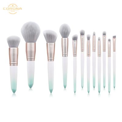 China Angular Blush Custom Logo 12pcs Luxury White Gradient Synthetic Hair Crystal Wooden Handle Makeup Brush Set for sale