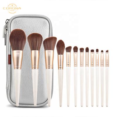 China Angular Blush Wooden Handle High Quality Professional White Pink Green White Goat Hair Makeup Brush Set 13 Piece for sale