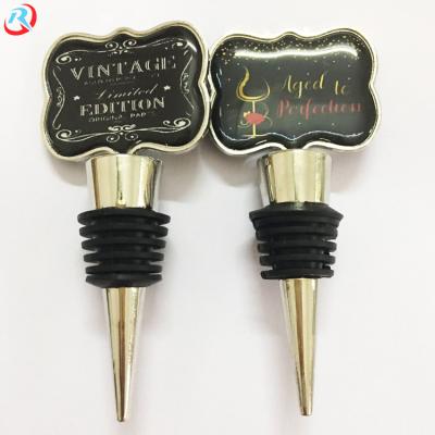 China Custom safe for kids clean logo metal wine bottle plug/wine bottle stopper zinc alloy wholesale for sale