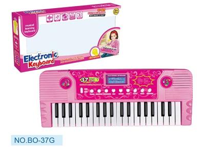 China Pink Children's Electronic Piano Keyboard With Microphone Battery Operated for sale