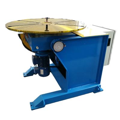 China Motorized Plant Rotate Turnover Tilt Turntable 600kg Welding Positioner With Foot Pedal for sale