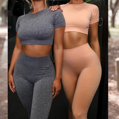 China 2020 Hot Sale Solid Color Breathable Pants With T Shirt Workout Yoga Sets Women Sports GYM High Waist Leggings Yoga Set Seamless Fitness for sale