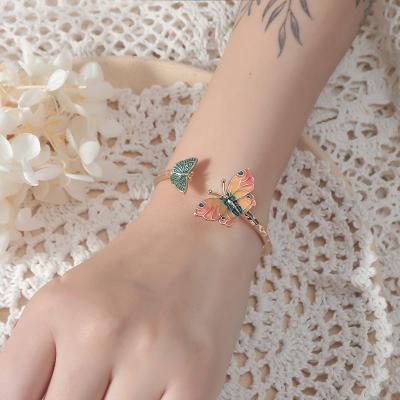 China Bohemia HOVANCI Adjustable Drip Oiled Chic Openable Colorful Butterfly Bracelets Bangles Butterfly Bracelet For Girl for sale