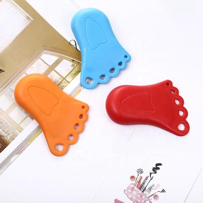 China Space Saver A389 Household Baby Child Protection Plastic Foot Door Stop Behind Door Crashproof Pad for sale