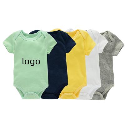 China Breathable Solid Color Candy Summer Baby INS Sling Jumpsuit Romper 0-1 Year Baby Short Sleeve Romper for sale