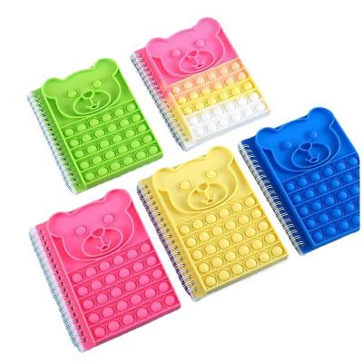 China 2021 New custom decompression notebook silicone spiral fidgety person notebook pop it for kids for sale