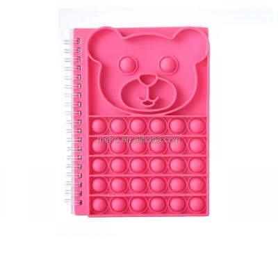 China Amazon hot sale silicone pop cover spiral notebook children back to school fidgety person toys push loose spiral pop bubble notebook A5 for sale