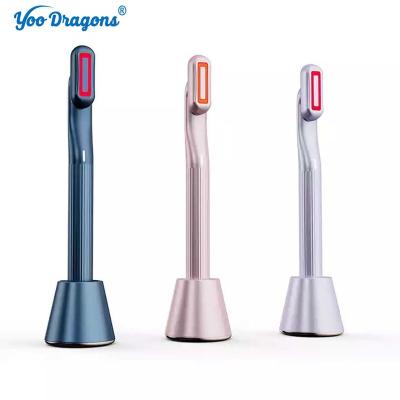 China Face Lift 360 Degree Rotation Advanced 4-in-1 LED Light Therapy Face EMS Facial Eye Beauty Massager Red Light Skincare Wand for sale