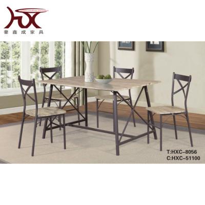 China Firmly 5 Pieces MDF Metal Top Dining Table Set Rectangular Table Dining Sets for sale