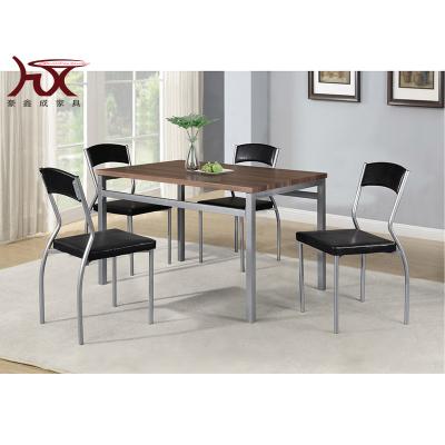 China Firm With Rectangular Metal Dining Table Top Table Set Soft Cushion 5 Pieces MDF Dining Sets for sale