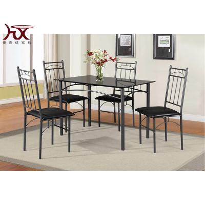 China Traditional With Rectangular Glass Top Table Set Metal Dining Table Soft Cushion 5 Pieces Dining Sets for sale