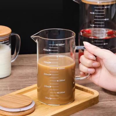 China Sustainable Kitchen 250ml 350ml 500ml 1000ml Handmade Glass Measuring Cup With Scale for sale