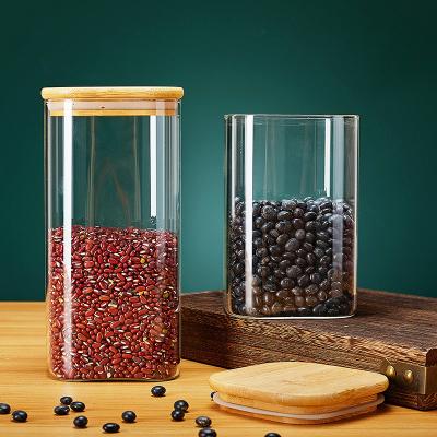 China Freshness Preservation Factory Custom size Handblown Airtight square glass storage jar with wood lid for sale